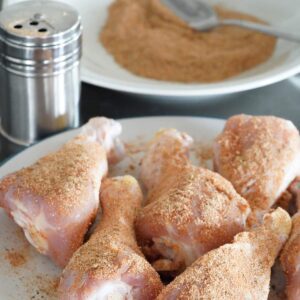 Chicken legs with dry rub on it